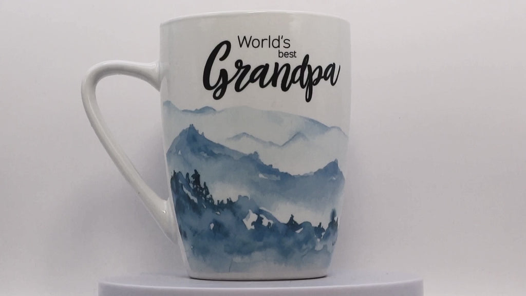Jumbo Tasse XL 350 ml mit Schriftzug "World´s best Grandpa" mit blauen Gebirgsbild