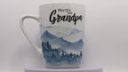 Jumbo Tasse XL 350 ml mit Schriftzug "World´s best Grandpa" mit blauen Gebirgsbild